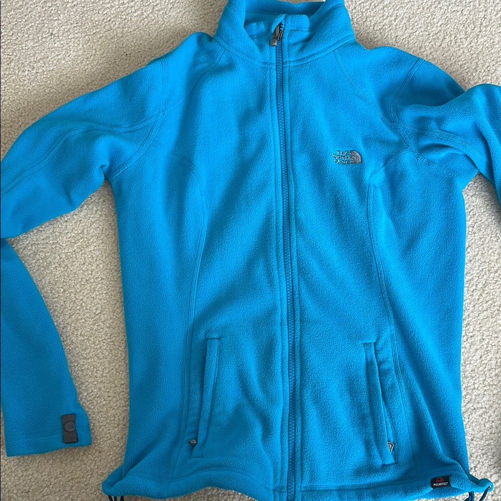 Women’s North Face bright blue zip up